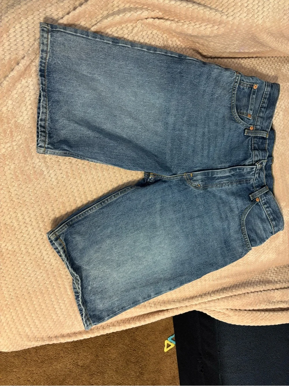 Levi's blue denim jean shorts 526 with tan leather patch